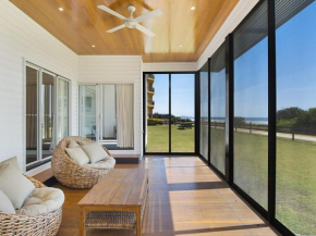 Abode on Bilinga - Absolute Beachfront Holiday Home walk over the sand dunes to the ocean